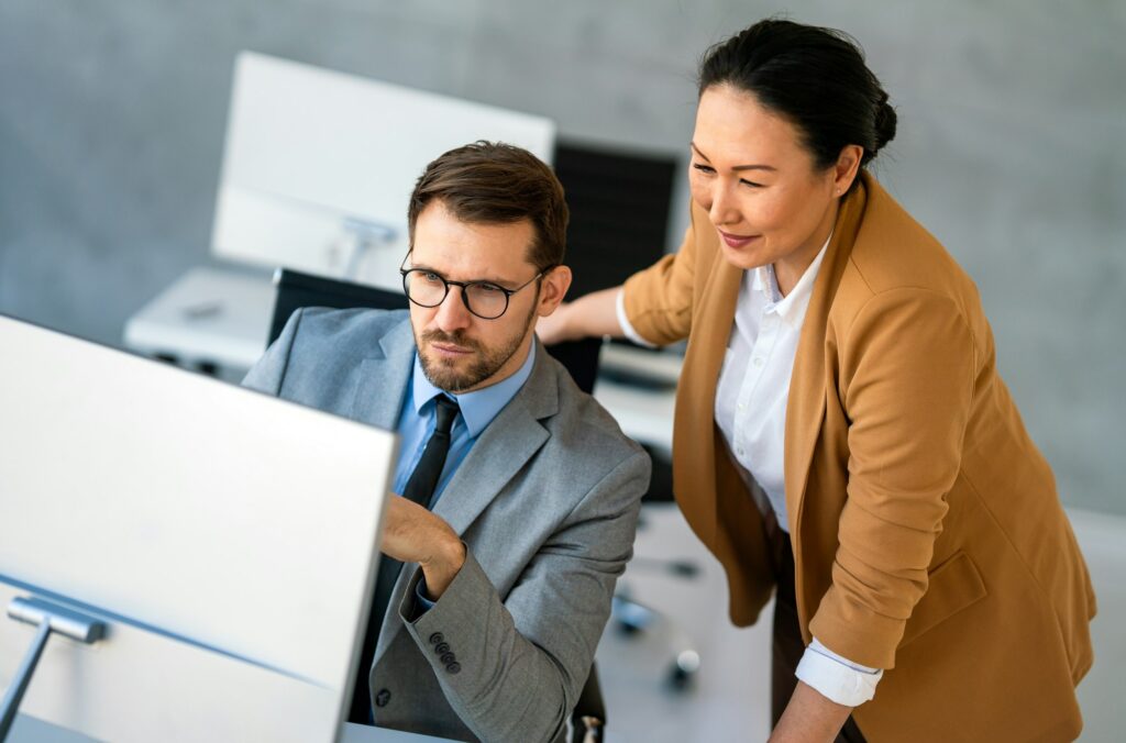 CEO executive manager mentor giving consultation on financial operations to colleague